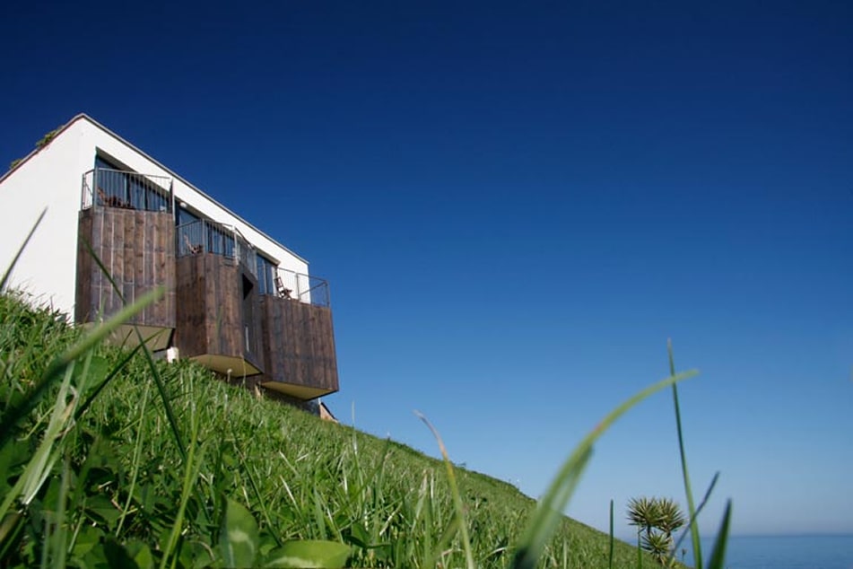 Fully equipped double rooms with views of the Cantabrian Sea